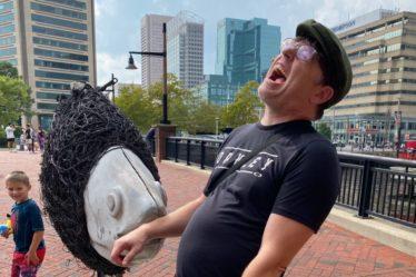 Brian miming getting bit by a giant fish