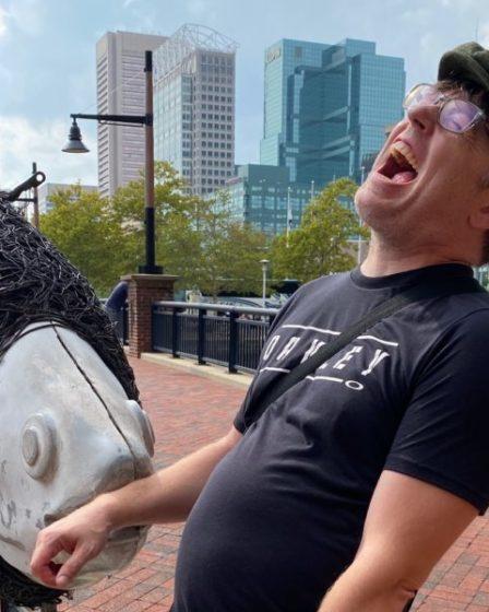 Brian miming getting bit by a giant fish